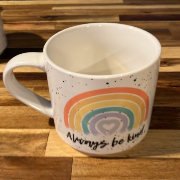 Set of 4 Coco and Lola coffee mugs in wire rack. - Picture 5 of 8